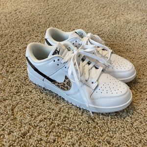 Nike Air Forces with a cheetah print swoop